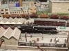 wd_90566_passing_through_ramsbottom_with_a_loaded_coal_train_ramsbottom_paper_mill_is_in_the_back_ground